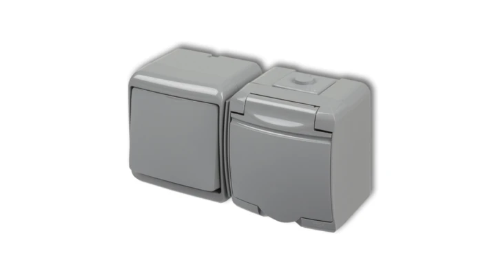 JUNIOR Łącznik jednobiegunowy + gniazdo hermetyczne (klapka popielata) popielaty 10WGHH-1