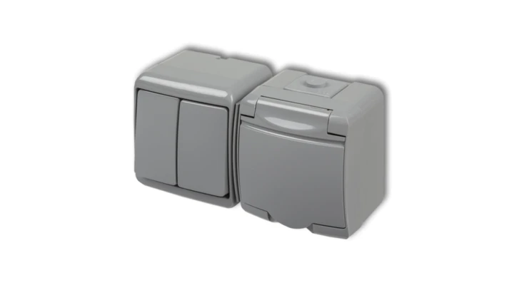 JUNIOR Łącznik świecznikowy + gniazdo hermetyczne (klapka popielata) popielaty 10WGHH-2