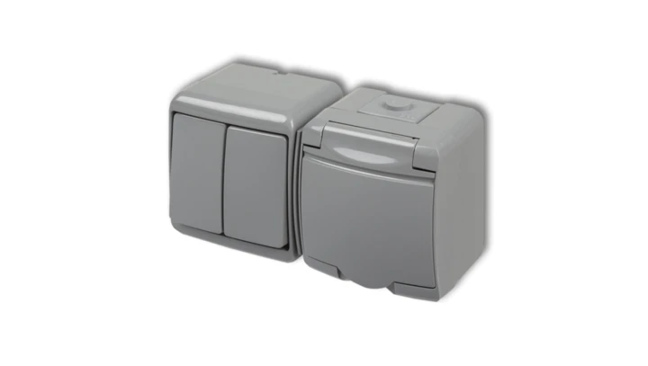 JUNIOR Łącznik świecznikowy + gniazdo hermetyczne (klapka popielata) popielaty 10WGHH-2p