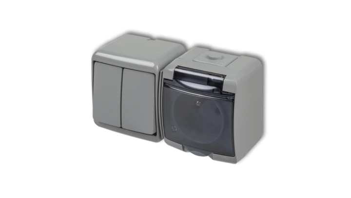 JUNIOR Łącznik świecznikowy + gniazdo hermetyczne (klapka dymna) popielaty 10WGHH-2d