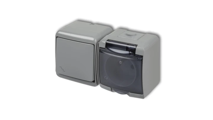 JUNIOR Łącznik schodowy + gniazdo hermetyczne (klapka dymna) popielaty 10WGHH-3dp